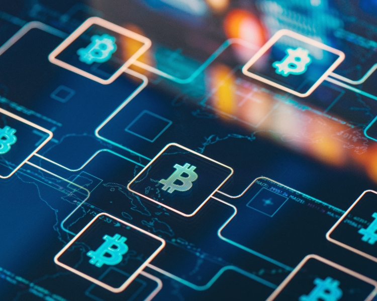 Bitcoin Symbole auf einer Grafik, die die Verbreitung von Bitcoin veranschaulichen soll