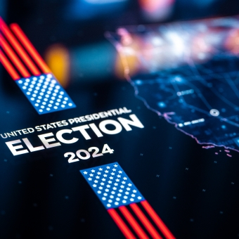 Logo der US Wahlen mit der Welt im Hintergrund abgebildet.